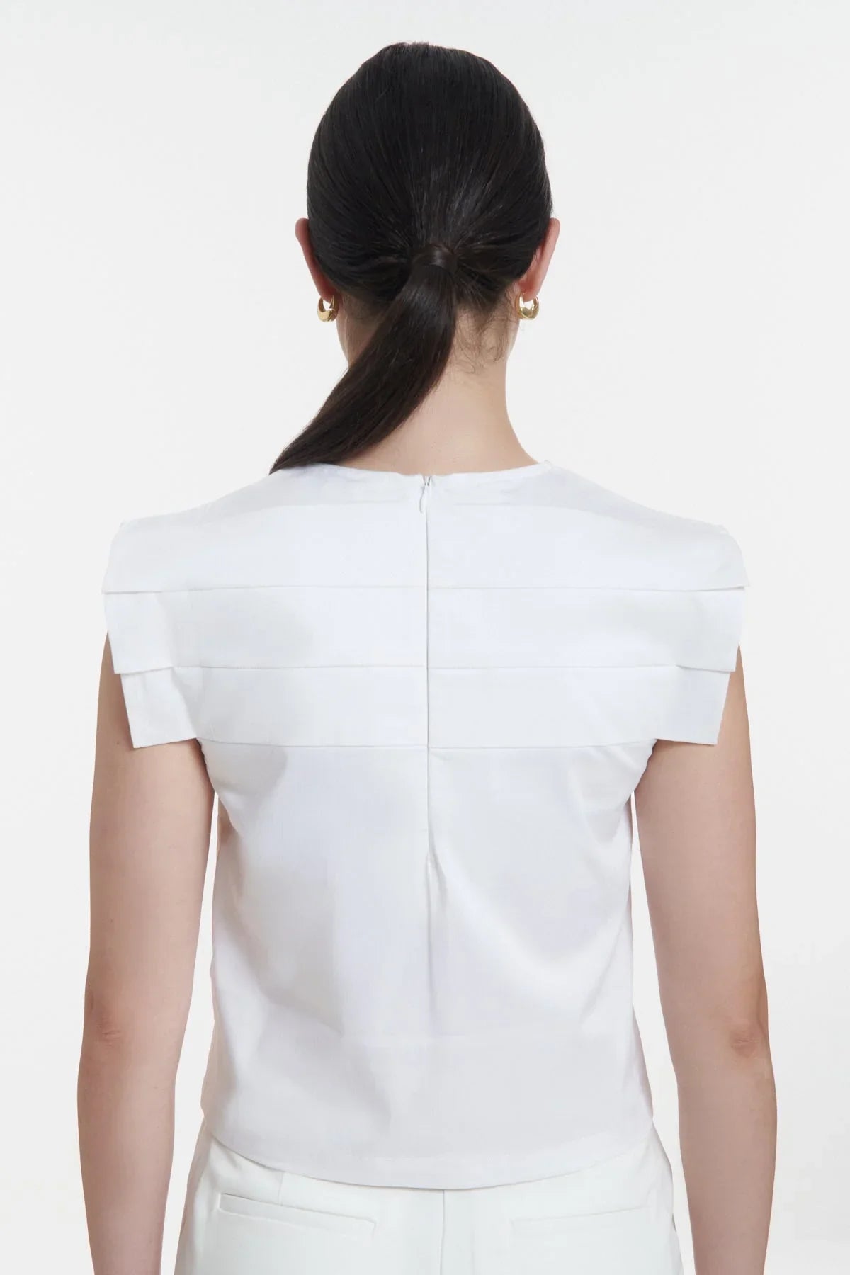 Chiara. White Sleeveless Pleated Top - UPTOANI